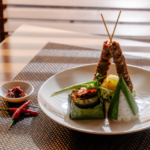 Plated gourmet dish served on board