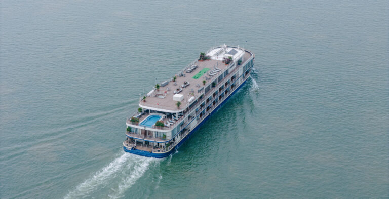 Aerial view of the Victoria Mekong sailing on calm water
